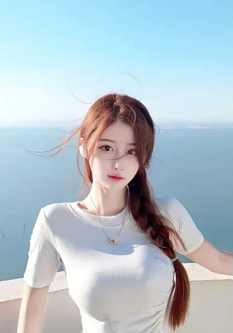麻花辫美女，海岸边的白衫美女手机壁纸照片
