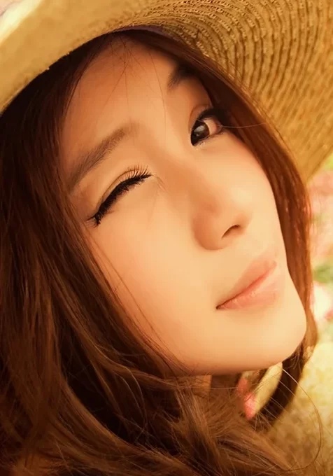 戴着草帽的美女高清手机桌面壁纸